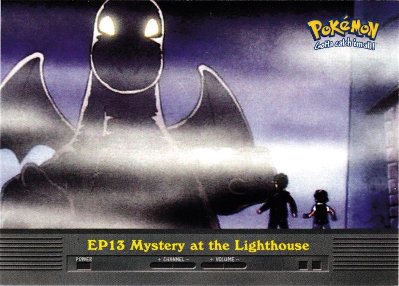 TV screen showing Pokémon episode title 'EP13 Mystery at the Lighthouse' with two trainers facing a large dark dragon‑like figure emerging from fog.